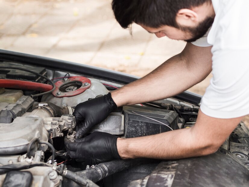 The Top Issues Every BMW Owner Should Know Man-doing-maintenance-engine_23-2148254110